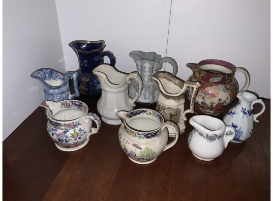 10 Ironstone And Oriental Pitchers  And Creamers