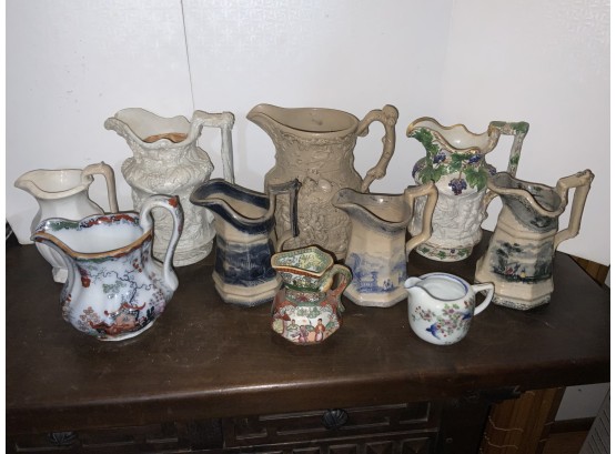 10 Assorted Creamers And Pitchers By Assorted Makers Including Masons And Others