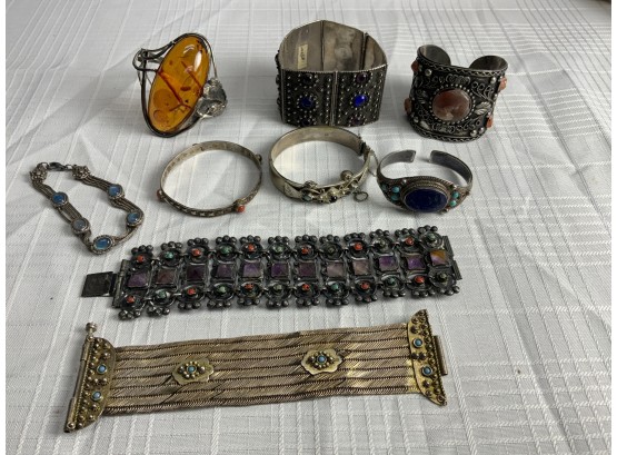 9 Silver Bracelets And Cuffs With Stones 323.1 Grams