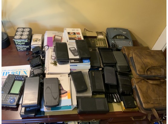 Large Group Of Assortd HP Nad Texas Instrument Calculators And Graphing