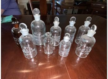 9 Pharmaceutical Bottles With Raised Letters
