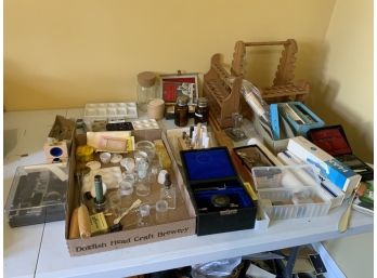 Assorted Scientific Pieces Including Beakers, Test Tube Stands, Weights And More
