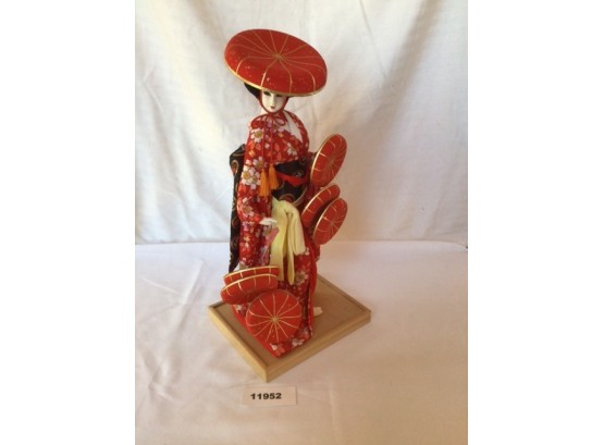 Japanese Doll With An Attached Base