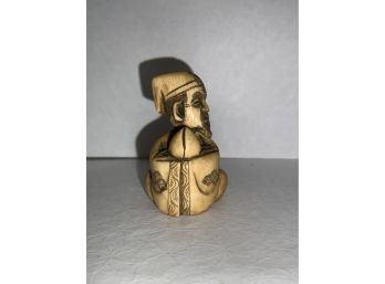 Carved Netsuke With A Head The Moves