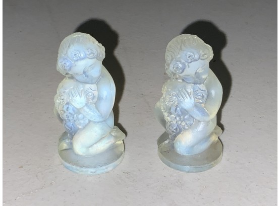 A Pair Of Sabino Paris Opalescent Art Glass Putti With Flowers