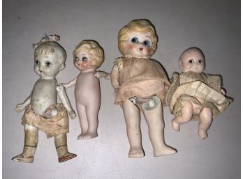 4 Porcelain Kewpie Style Dolls