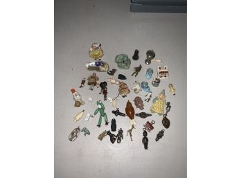 Mini Dolls And Other Assorted Mini Items Including Charms And Pendants