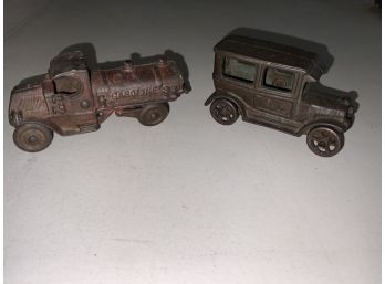 2 Cast Iron Toys Including A Hubley Gas Tanker And An Arcade Sedan