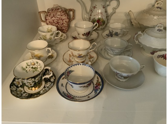 Collection Of Teacups, Saucers And Tea Pots