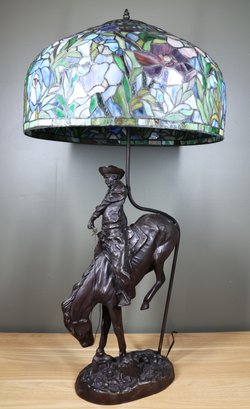 Large Remington Bronze Cowboy Table Lamp With Tiffany Style Glass Shade
