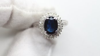 NATURAL SAPPHIRE RING SET IN SOLID PT900 PLATINUM WITH DIAMOND HALO 2.18CTW, 5.13 GRAMS, SIZE 6.5 DIAMONDS