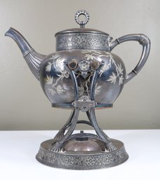 James W. Tufts, Quadruple Plated Tilting Teapot W/ Stand