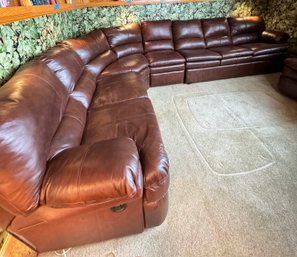 LARGE FAUX LEATHER RH SECTIONAL WITH RECLINER AND PULL OUT QUEEN BED