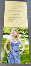 AUTOGRAPHED 8X10 COLOR SIGNED PHOTOGRAPH IN STRIPED DRESS TAYLOR SWIFT W/COA