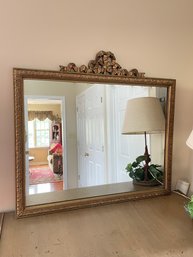 LARGE GOLD GILDED ANTIQUE BOW MIRROR
