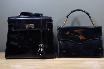 Lot- (2) Black Purses With Gold Detailing - One With Lock