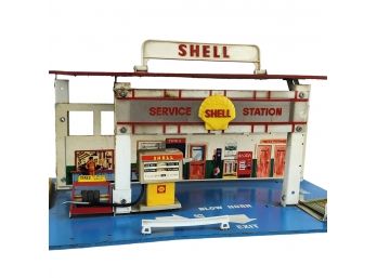 Vintage Mechanical Wind-Up Collapsable Shell Service Gas Station Miniature Toy