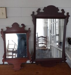 TWO CHIPPENDALE STYLE HANGING WALL MIRRORS