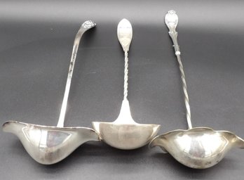 Three Plated Silver Punch Ladles.