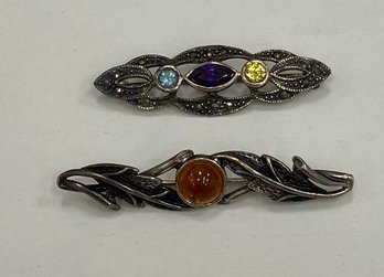 Two Sterling Silver Brooches One With Amber