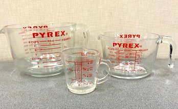 Three Pyrex Glass Measuring Cups