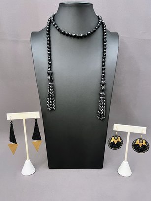 Black Glass Beaded Lariat Necklace With Two Pair Of Gold And Black Earrings