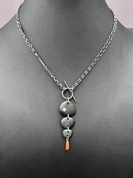 Unsigned Skipping Stones Necklace On A Gunmetal Chain With A Small Pearl And Red Stone Dangle  16' Long