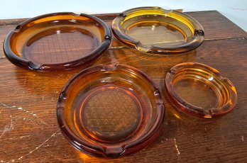 4 Vintage Thick Amber Art Glass Ashtrays