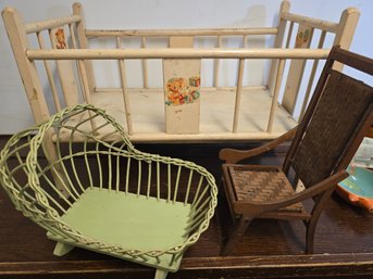 3 Pieces Of Antique Doll Furniture Crib, Rocking Wicker Bassinett And A Folding Chair