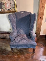 Upholstered Wingback Chair With Carved Legs