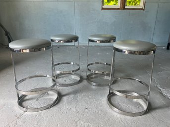 Set Of Four Bernhardt Aro Polished Steel And Leather Swivel Counter Stools