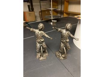 Pair Bronze Candlesticks Of Boy On Unicycle Lot 1 Of 2