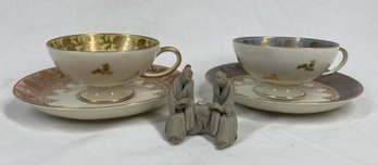 2 Rosenthal German China Teacup And Saucers With Chinese Mud Clay Figurines
