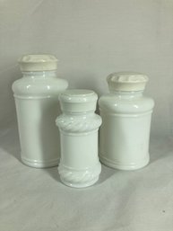 Set Of White Salt And Pepper Shakers