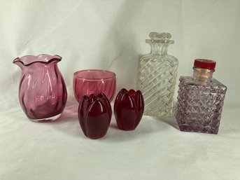 Set Of Red And Assorted Glass Pieces And Containers