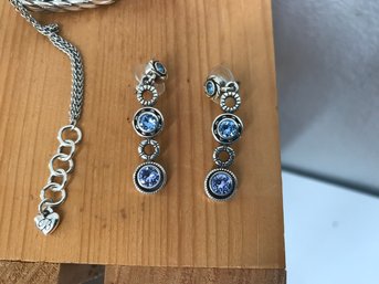 Lot Of Silver Colored Earrings And Necklace