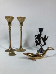 Set Of Gold Colored Candle Holders With Other Gold Colored Display Pieces