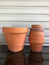 Set Of Assorted Small Pots With Large Pot