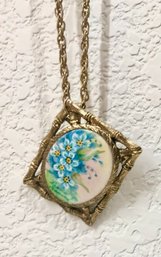 2 Painted Floral Pendants With Gold Colored Chain