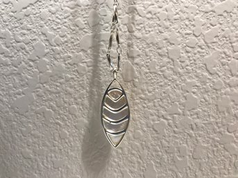 Silver Colored Necklace With Leaf Pendant