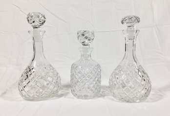 Trio Of Cut Glass Decanters With Fancy Stoppers