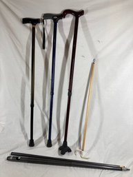 Group Of Canes And A Dressing Aid