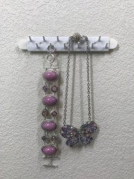 Lot Of Pink And Silver Colored Jewelry