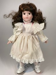 Porcelain Doll In White Dress