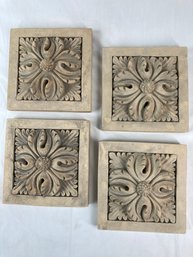 Collection Of Four Cast Wall Hanging Tile