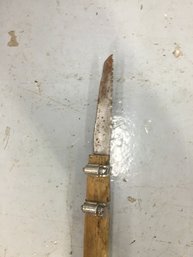 Sawblade Connected To A Handle