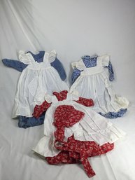 Set Of Hand Crafted Doll Dresses