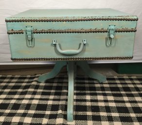 Whimsical Suitcase On A Wood Stand Table