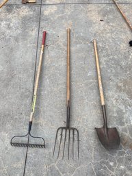 Rake Pitchfork And A Shovel