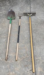 Two Rakes And A Shovel